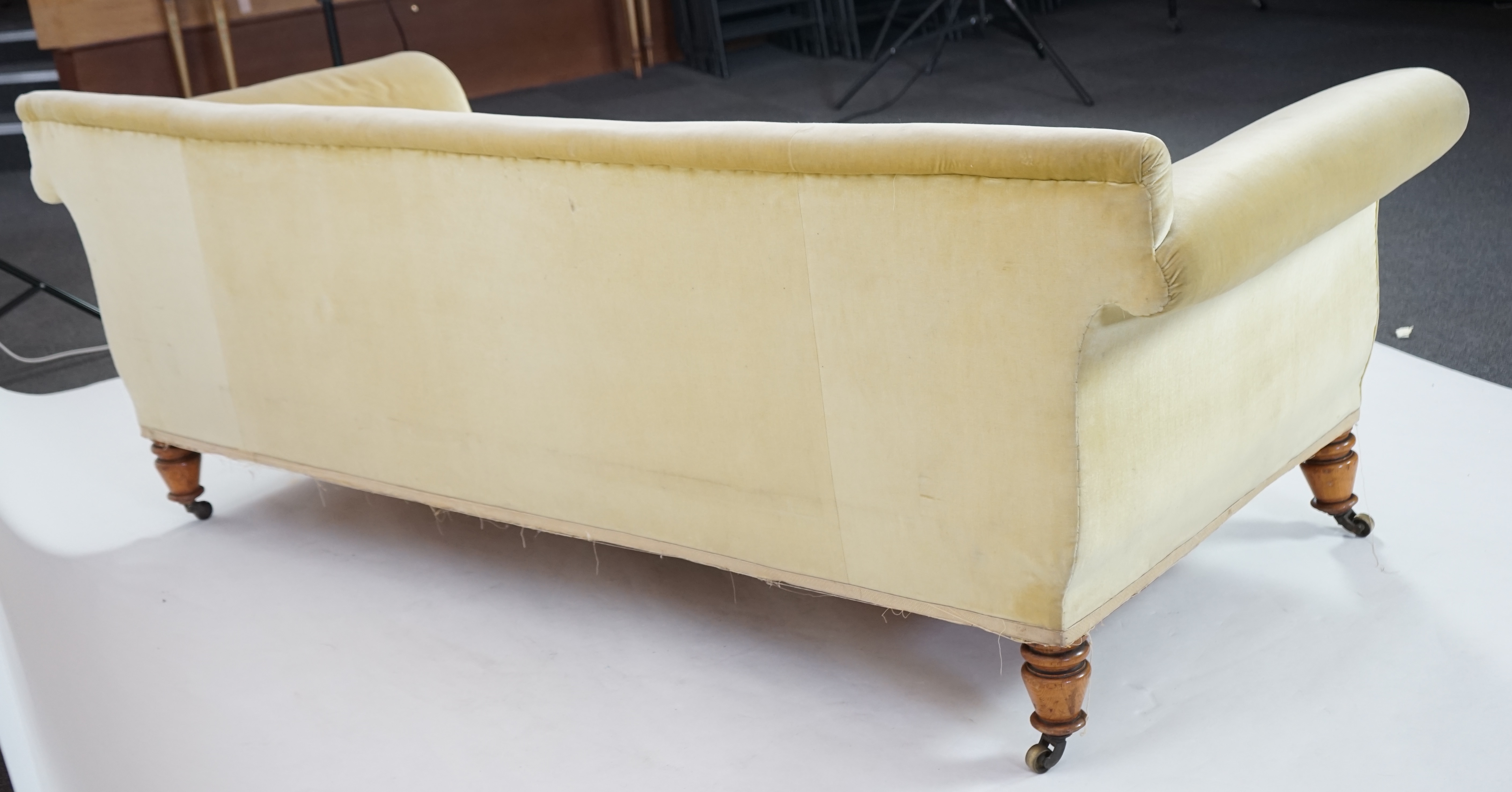 A large Victorian sofa, in the manner of Howard & Sons